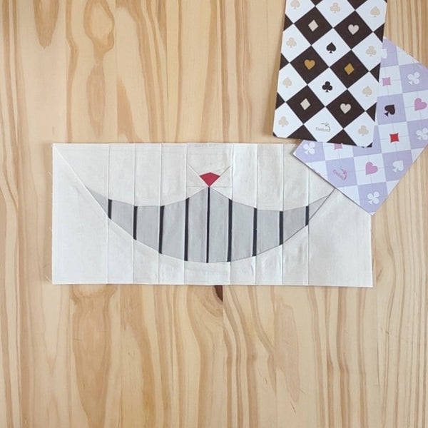 ENIGMATIC GRIN quilt block pattern