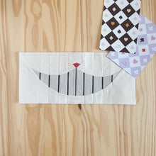 ENIGMATIC GRIN quilt block pattern